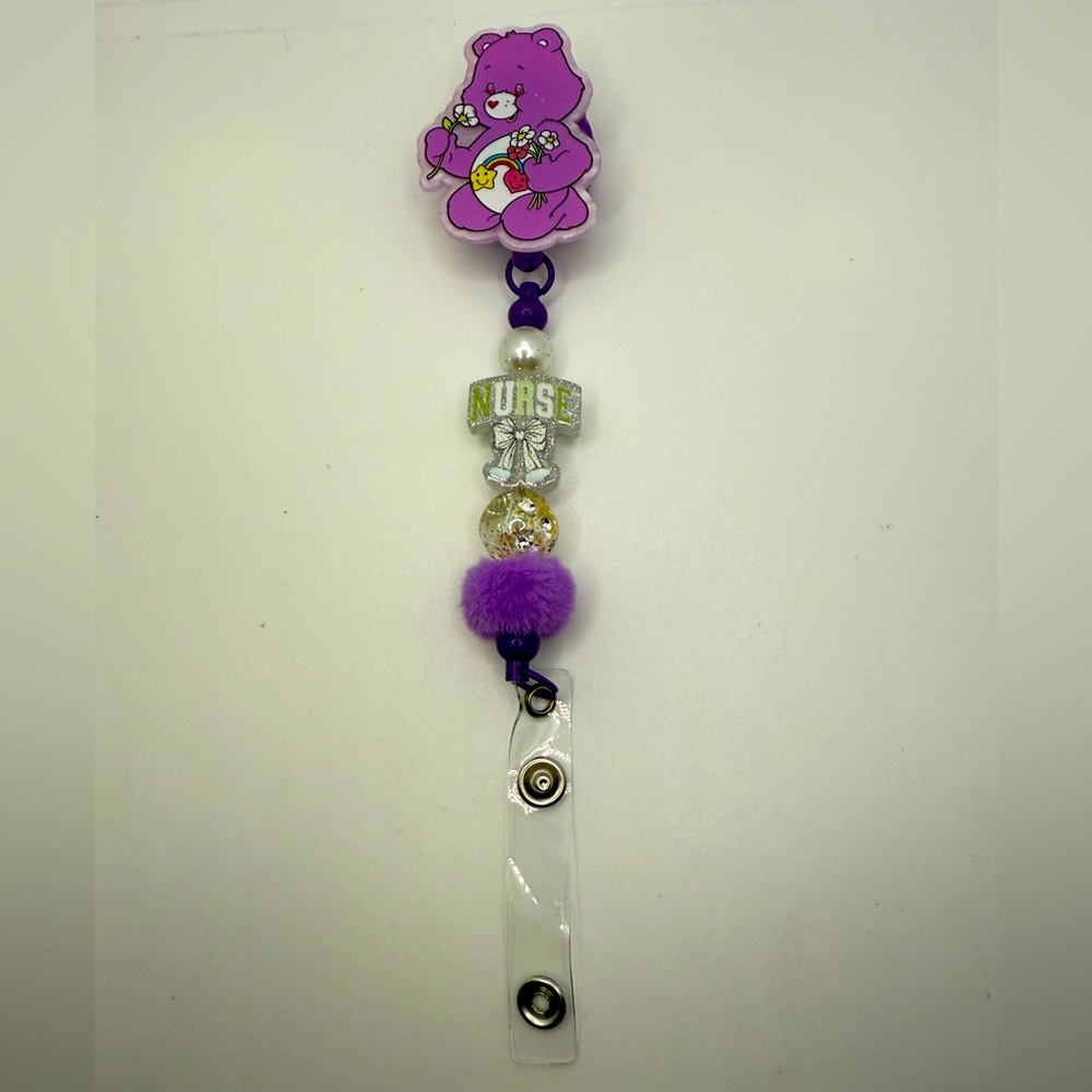 Purple Care Bear Nurse Badge Reel